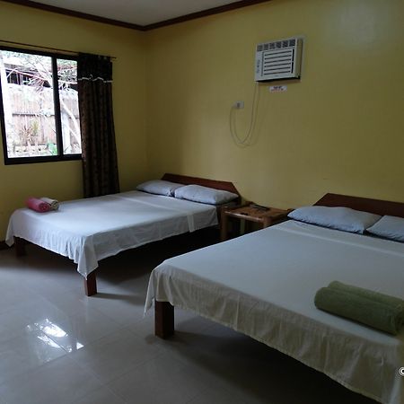 Alona Grove Tourist Inn Tawala  Bagian luar foto