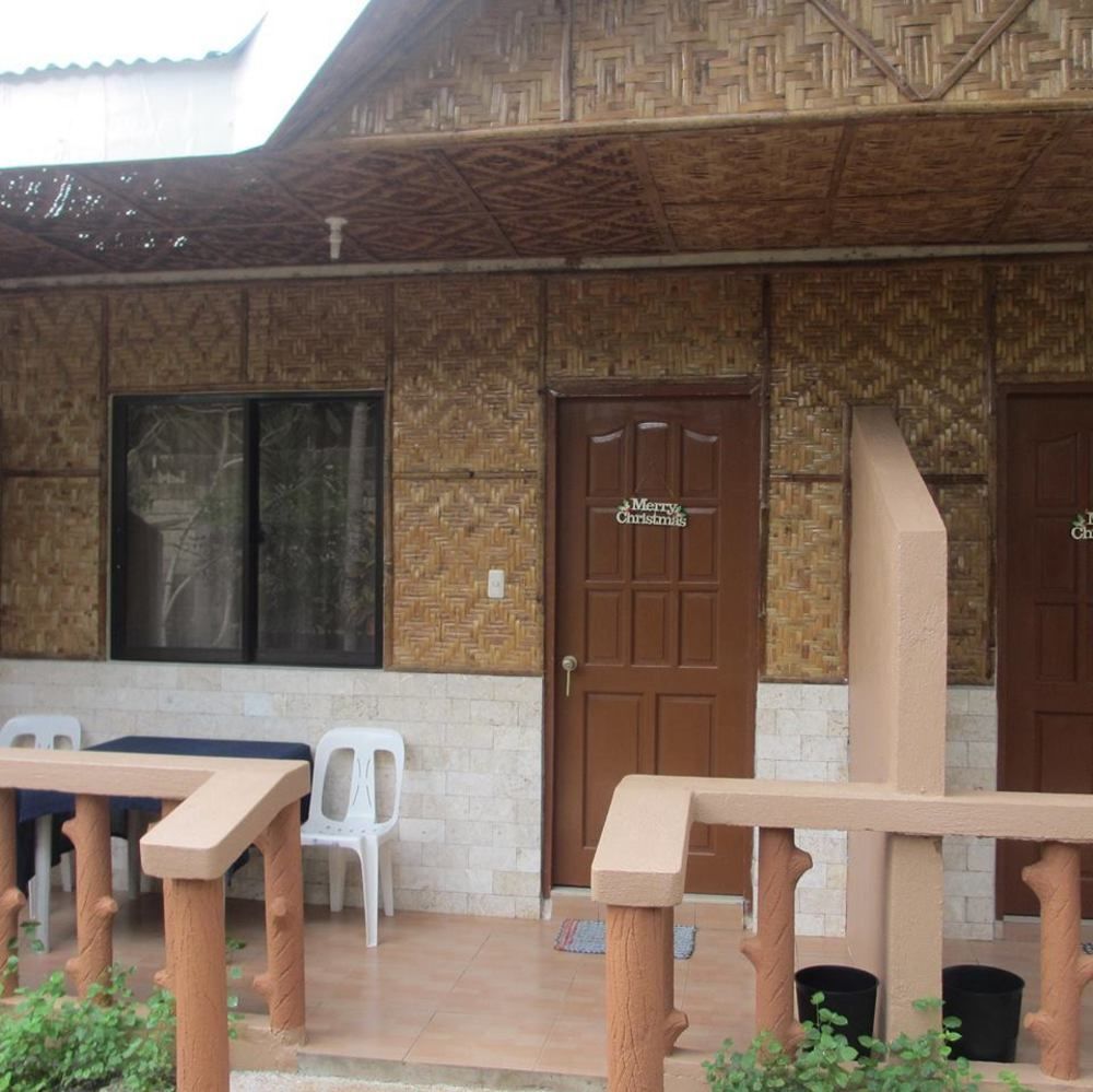 Alona Grove Tourist Inn Tawala  Bagian luar foto