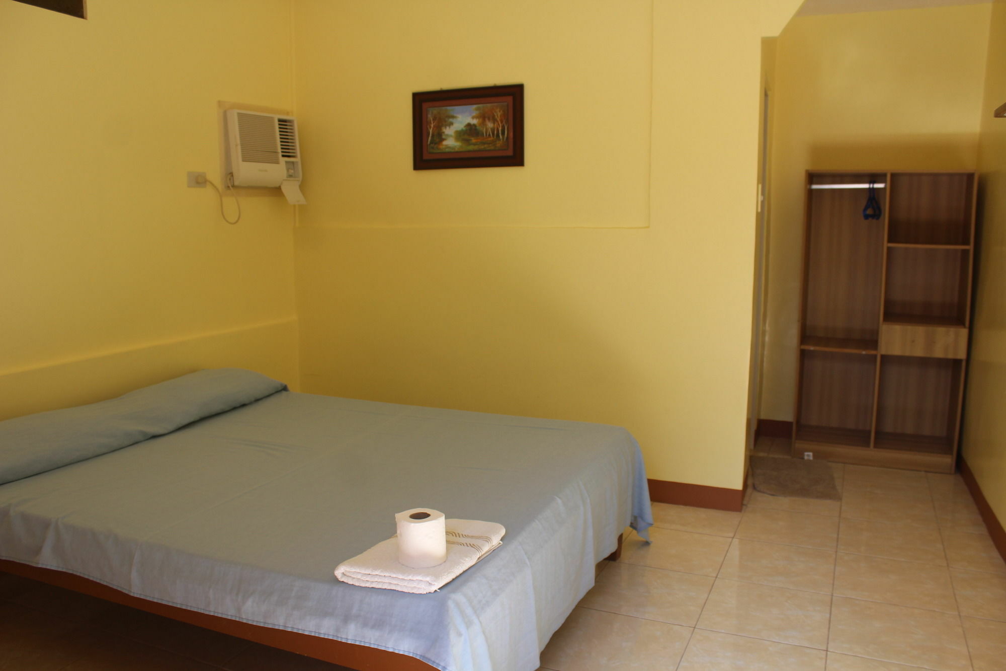 Alona Grove Tourist Inn Tawala  Bagian luar foto