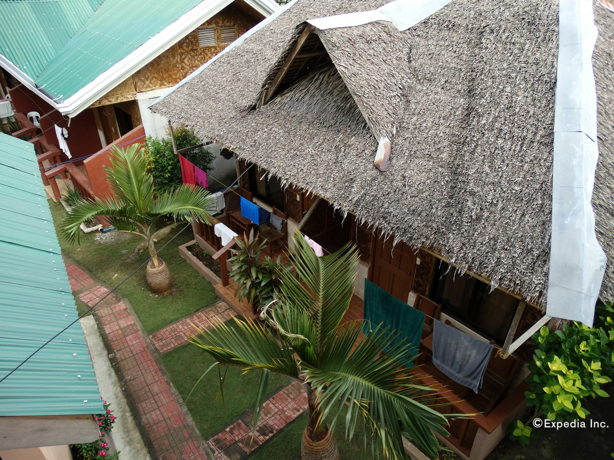 Alona Grove Tourist Inn Tawala  Bagian luar foto